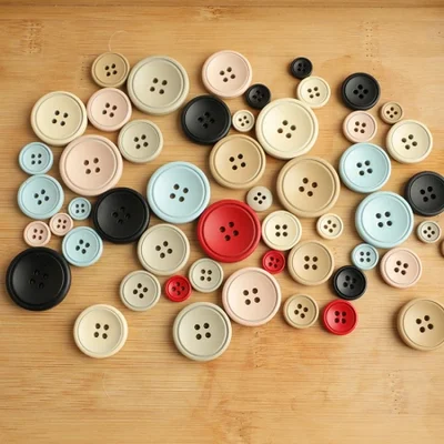 معطف الكشمير ذو الأزرار الملونة ذات الأربع عيون من الراتينج المتوفر في المخزون، وسترة، وسترة واقية، وزر سترة