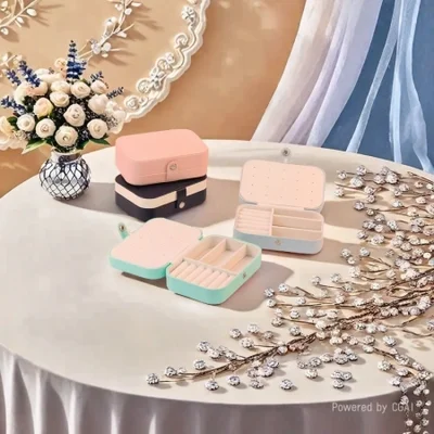 أكياس المجوهرات المحمولة للبيع المباشر من مصنع Zhihua، وصناديق تخزين المجوهرات الصغيرة متعددة الطبقات، وصناديق جلدية PU بسيطة متعددة الألوان