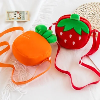 Factory wholesale of cute carrot plush toy backpacks, strawberry dolls, girls' and children's single-shoulder crossbody bags