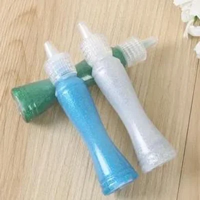 Gold powder in powder bottles, bright powder, sparkling powder, cross-stitch gold powder