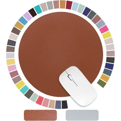لوحة ماوس جلدية مستديرة جديدة ونظيفة، وسادة مكتب جلدية صغيرة محمولة وبسيطة اللون، وسادة ماوس كمبيوتر