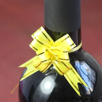 البيع بالجملة لأشرطة الزهور المسحوبة يدويًا وصناديق الهدايا المزخرفة وأكياس الهدايا والتغليف وأشرطة الختم والأقواس المربوطة