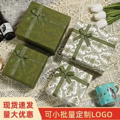 صناديق هدايا راقية بأغطية علوية وسفلية، وصناديق هدايا مقوسة، وصناديق تغليف خضراء مستطيلة كبيرة، وصناديق هدايا تذكارية متوفرة في المخزون