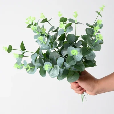 Wholesale of simulated single-stemmed eucalyptus money leaves, small short-stemmed eucalyptus leaves for wedding furniture decoration, and simulated green plant leaves