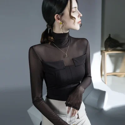 يقترن الجزء العلوي الجديد من التويد المرقعة للخريف والشتاء من Fushengji بطبقة أساسية أنيقة ذات رقبة عالية وأكمام طويلة