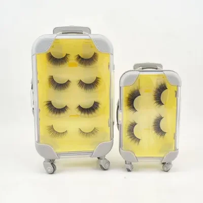 A pair of mini suitcases with a handle, a pair of mini suitcases, a false eyelash box, a packaging box, a mini storage suitcase