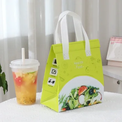 أكياس صندوق الغداء المعزولة المصنوعة من رقائق الألومنيوم غير المنسوجة من القماش، وأكياس ثلج قابلة للطي مقاومة للماء، وأكياس بينتو لحفظ الأطعمة الطازجة للنزهات بالجملة، وأكياس قماش غير منسوجة صديقة للبيئة