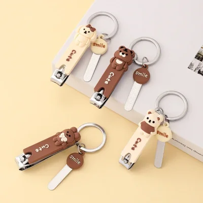Cute three-dimensional bear nail clippers keychain set, splash-proof carbon steel cartoon student nail clippers and nail files, portable