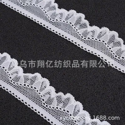 البيع بالجملة للدانتيل المطرز، والدانتيل النايلون، والدانتيل، وإكسسوارات الملابس، والستائر، وإكسسوارات فساتين الزفاف المتوفرة في المخزون